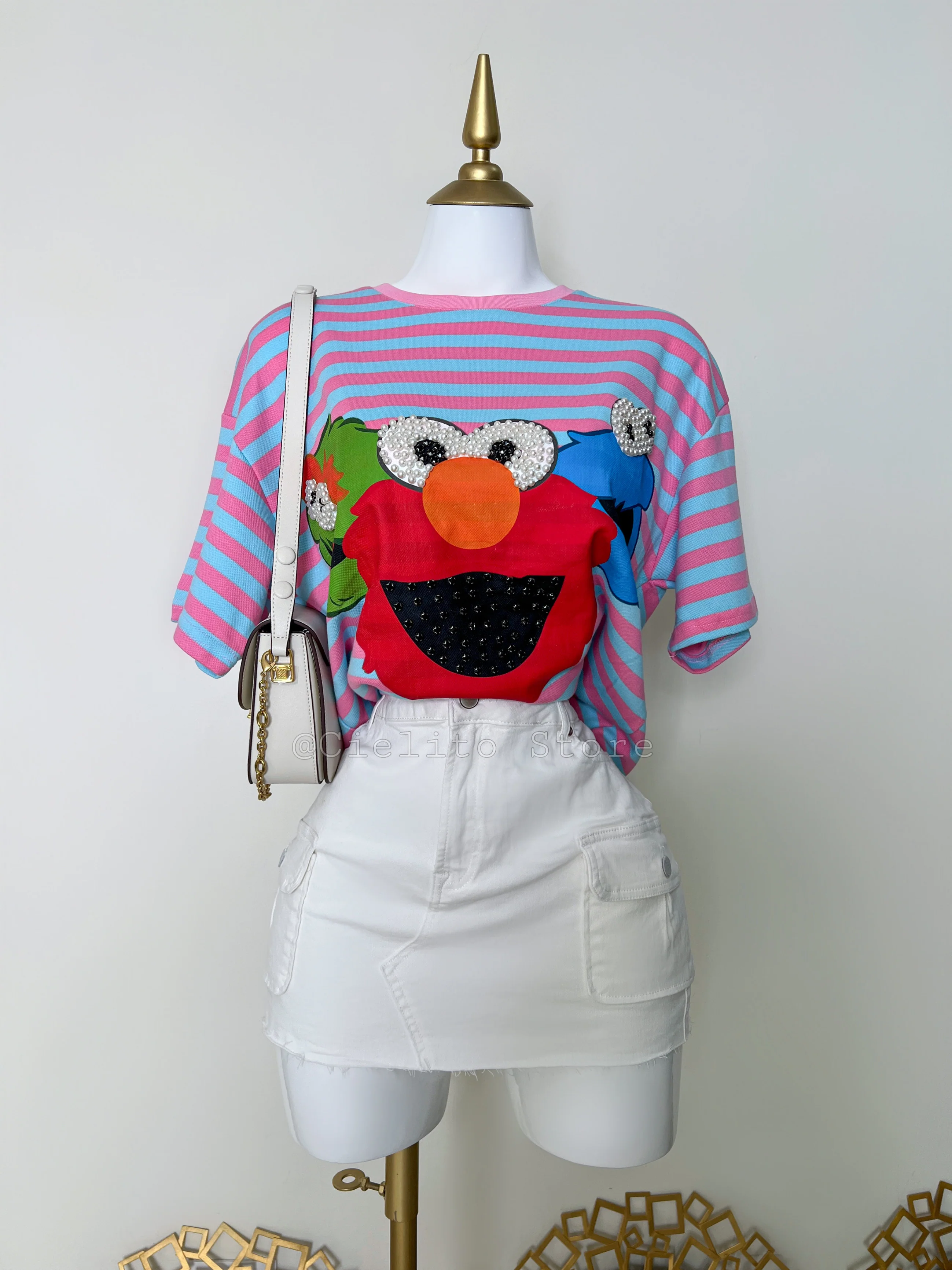 FALDA BLANCA CON BOLSAS
