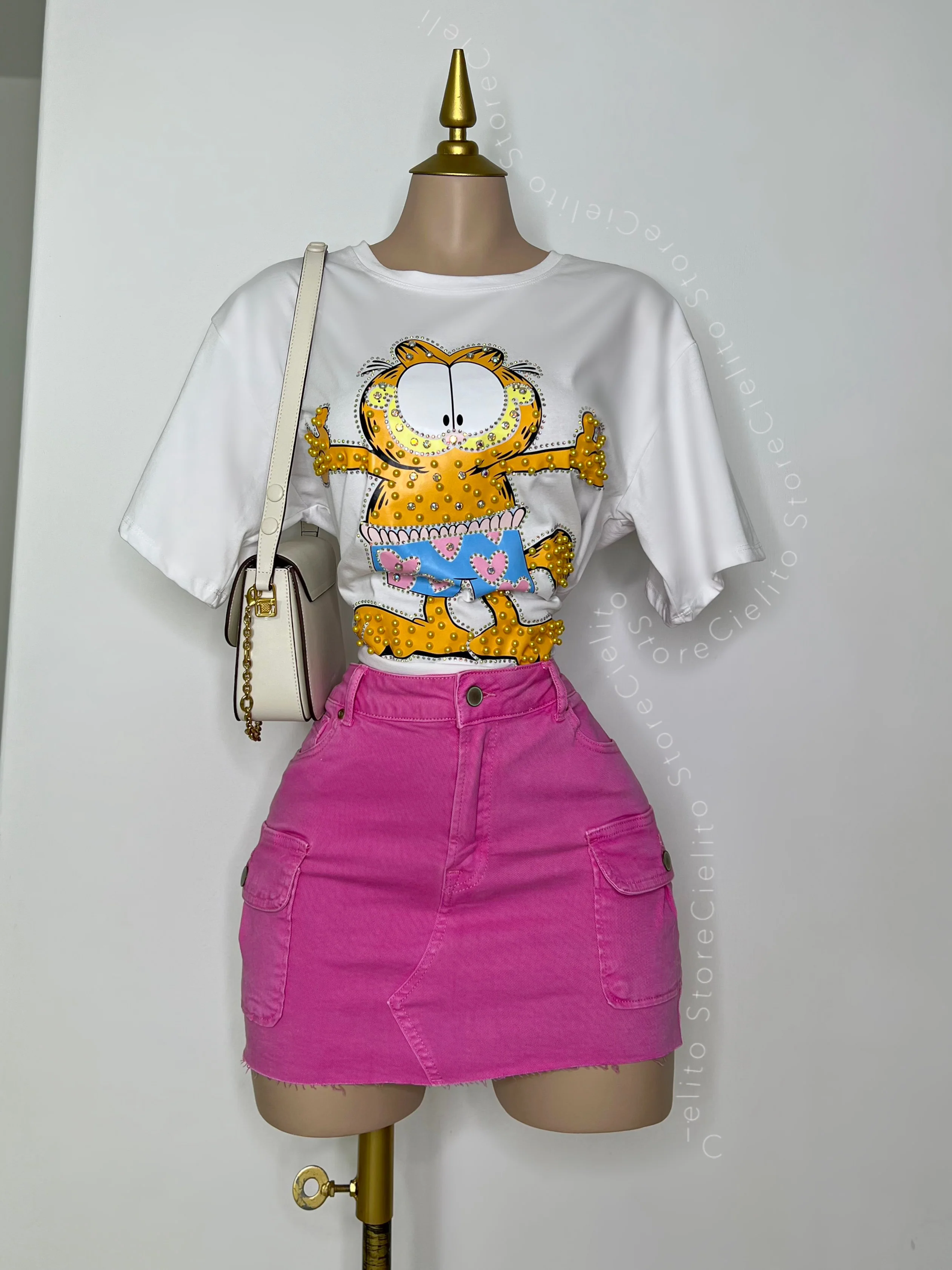 FALDA ROSA CON BOLSAS